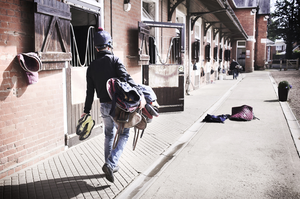 Finished for the morning, ryan walks to the tack room